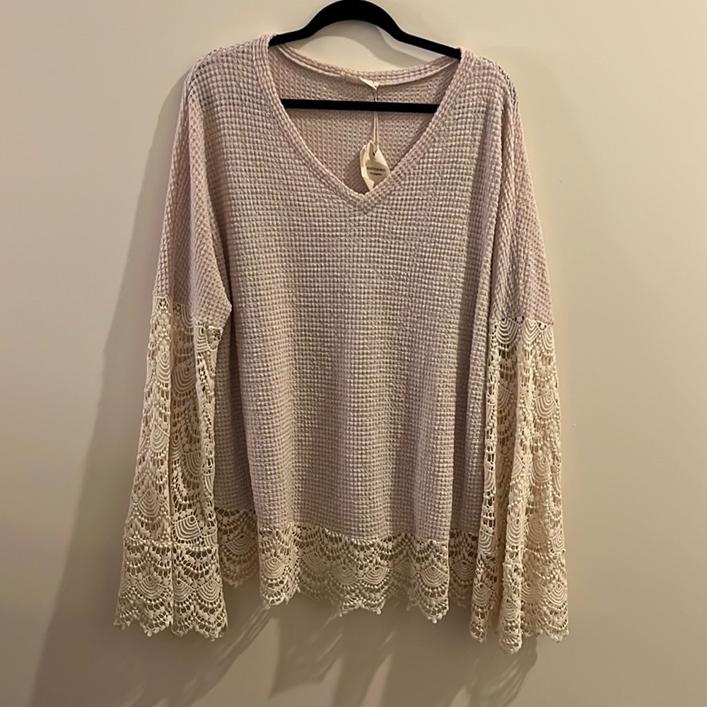 Waffle knit top with lace sleeves